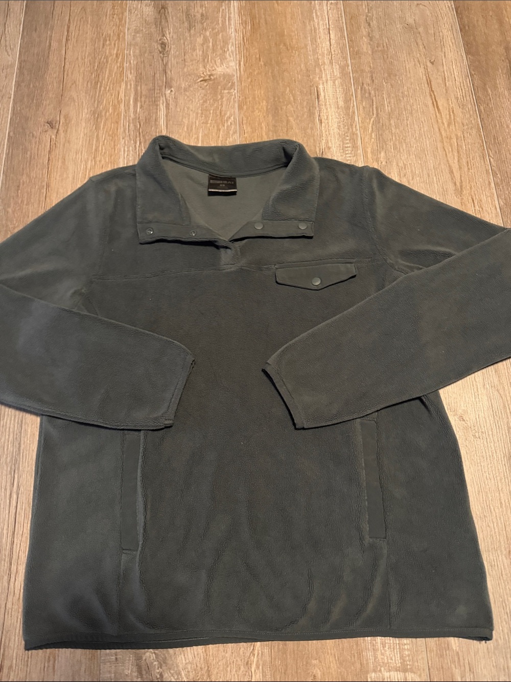 32 Degrees Heat fleece pullover features a quarter-snap button closure